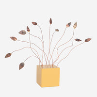 Square block w metal leaves, sun